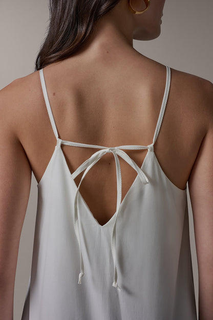 SLEEVELESS ASYMMETRIC TIE BACK BLOUSE - Cream