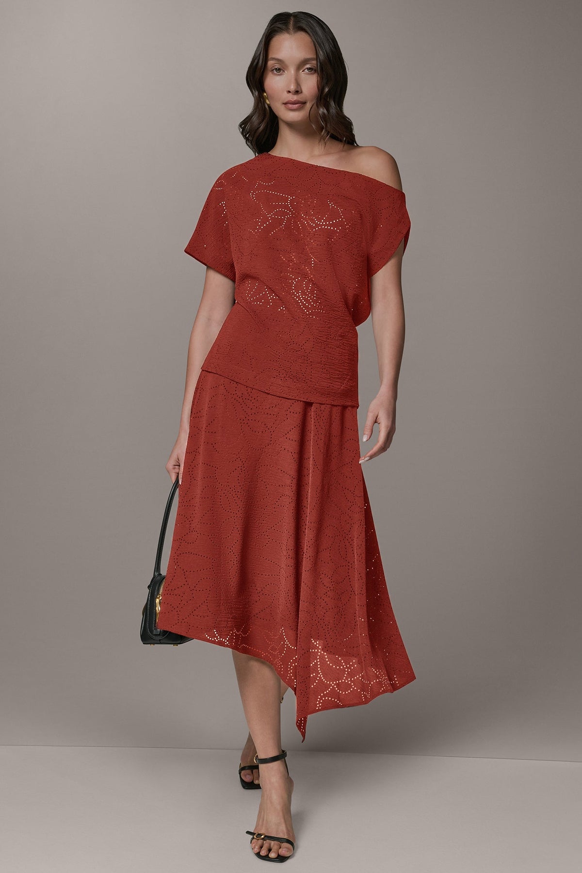 SLEEVELESS ASYMMETRIC LASER CUT TOP - Sunbaked