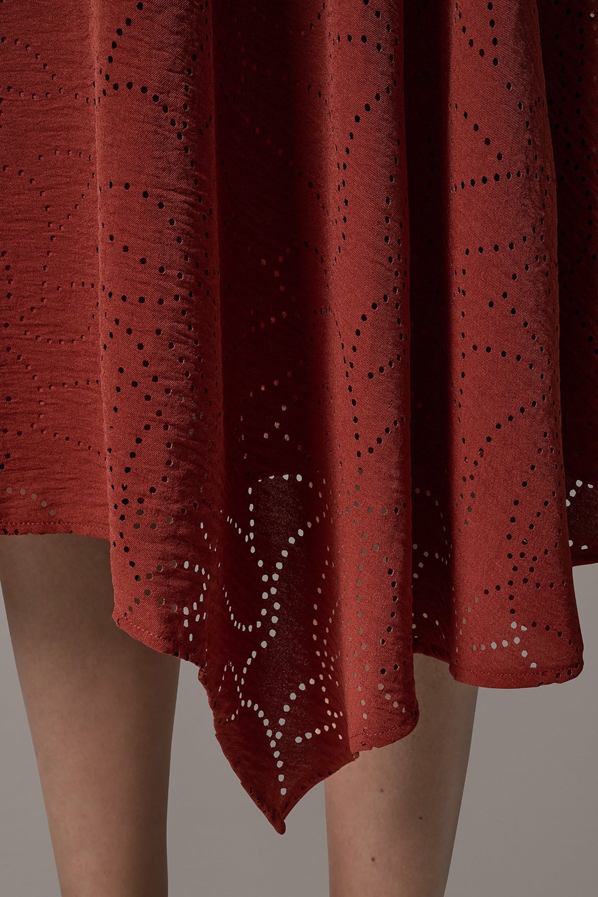 LASER CUT ASYMMETRIC MIDI SKIRT - Sunbaked