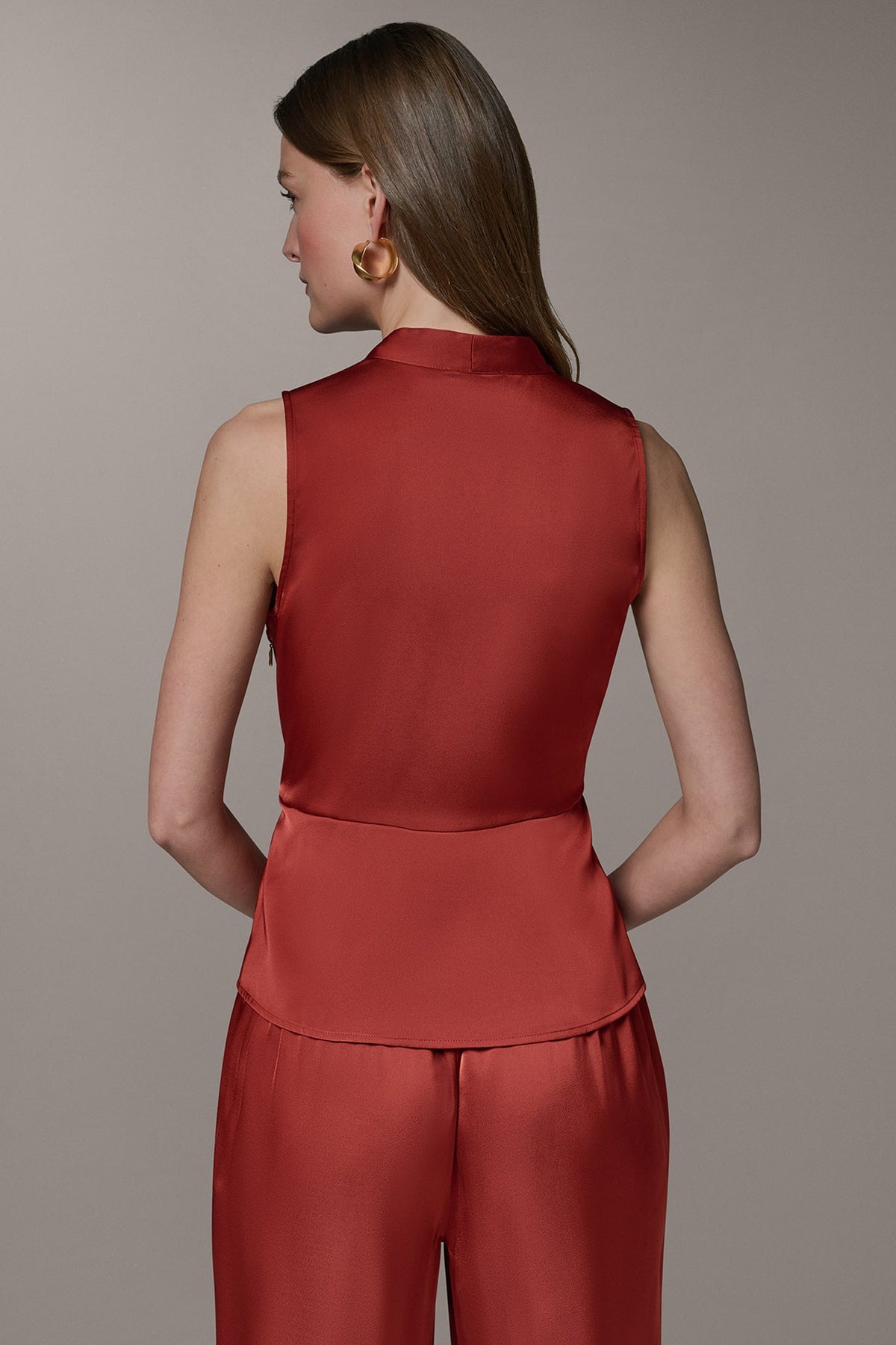 SLEEVELESS WRAP-EFFECT ASYMMETRIC PEPLUM BLOUSE - Sunbaked