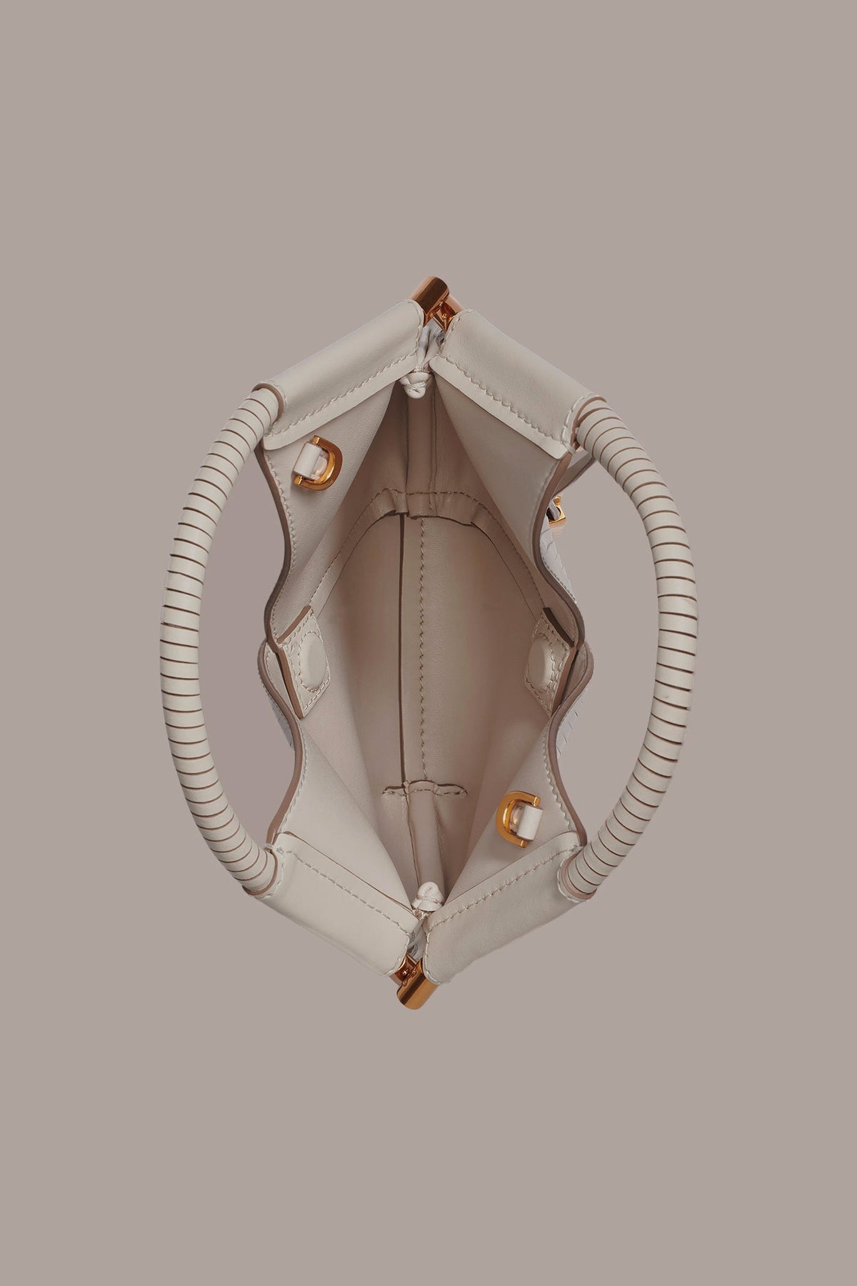 BALDWIN LASER-CUT LEATHER MICRO CROSSBODY BAG - Sand