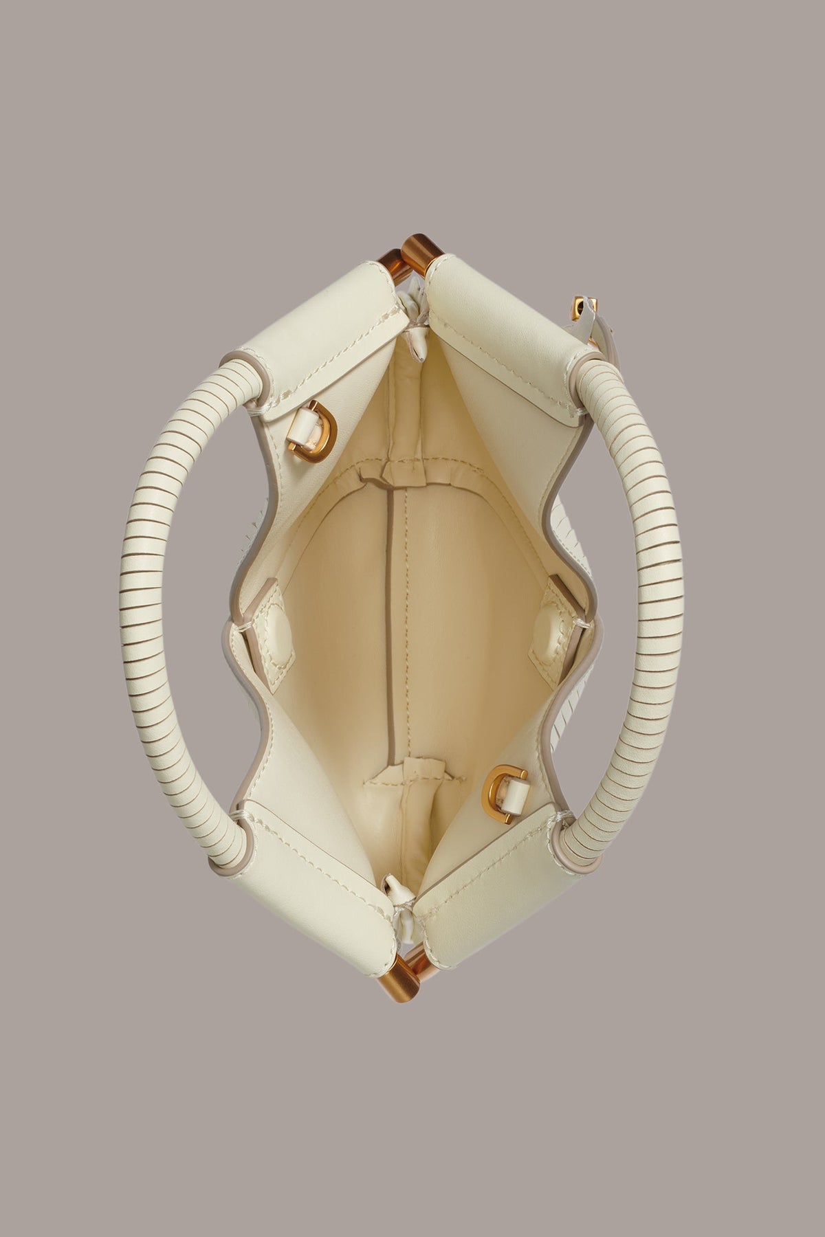 BALDWIN LASER-CUT LEATHER MICRO CROSSBODY BAG - Butter Cream