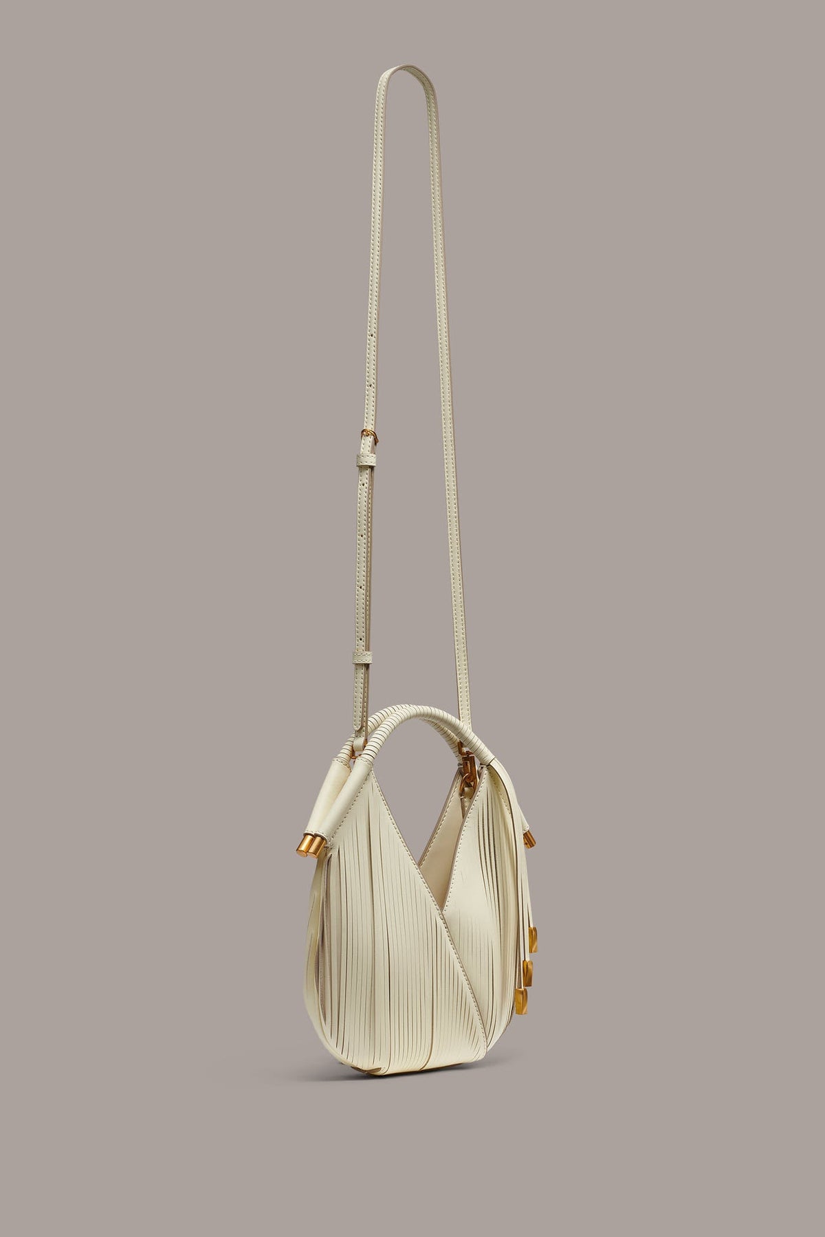 BALDWIN LASER-CUT LEATHER MICRO CROSSBODY BAG - Butter Cream